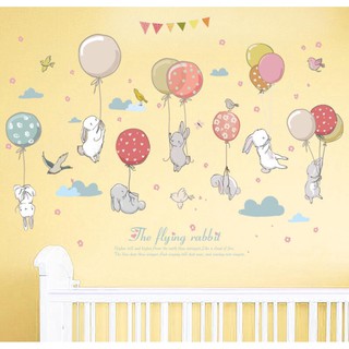 decal dán tường thỏ ôm bóng