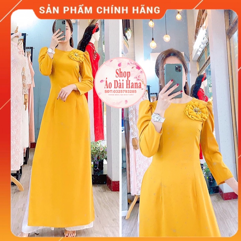 Áo dài vàng tay bồng đính bông hoa xinh nhẹ nhàng