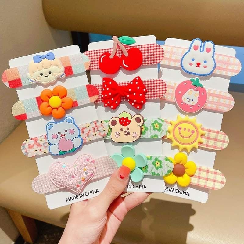 SET 3 MIẾNG DÁN TÓC SẮC MÀU ĐÍNH NƠ SIÊU YÊU CHO BÉ
