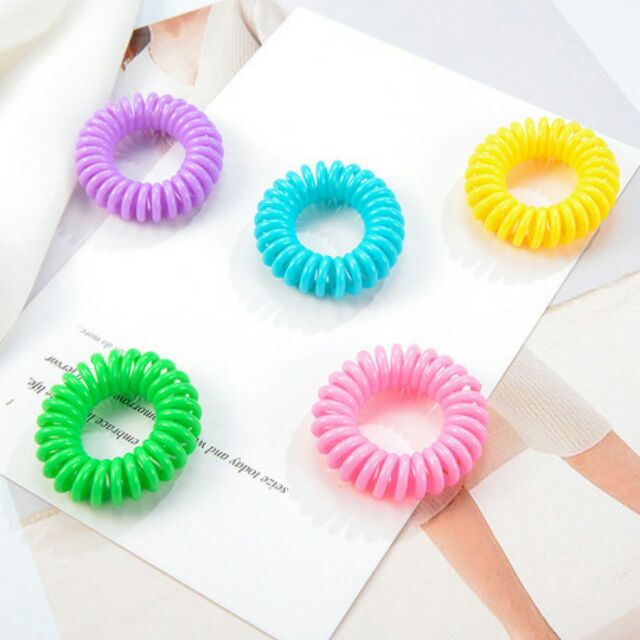 3 Cột tóc lò xo