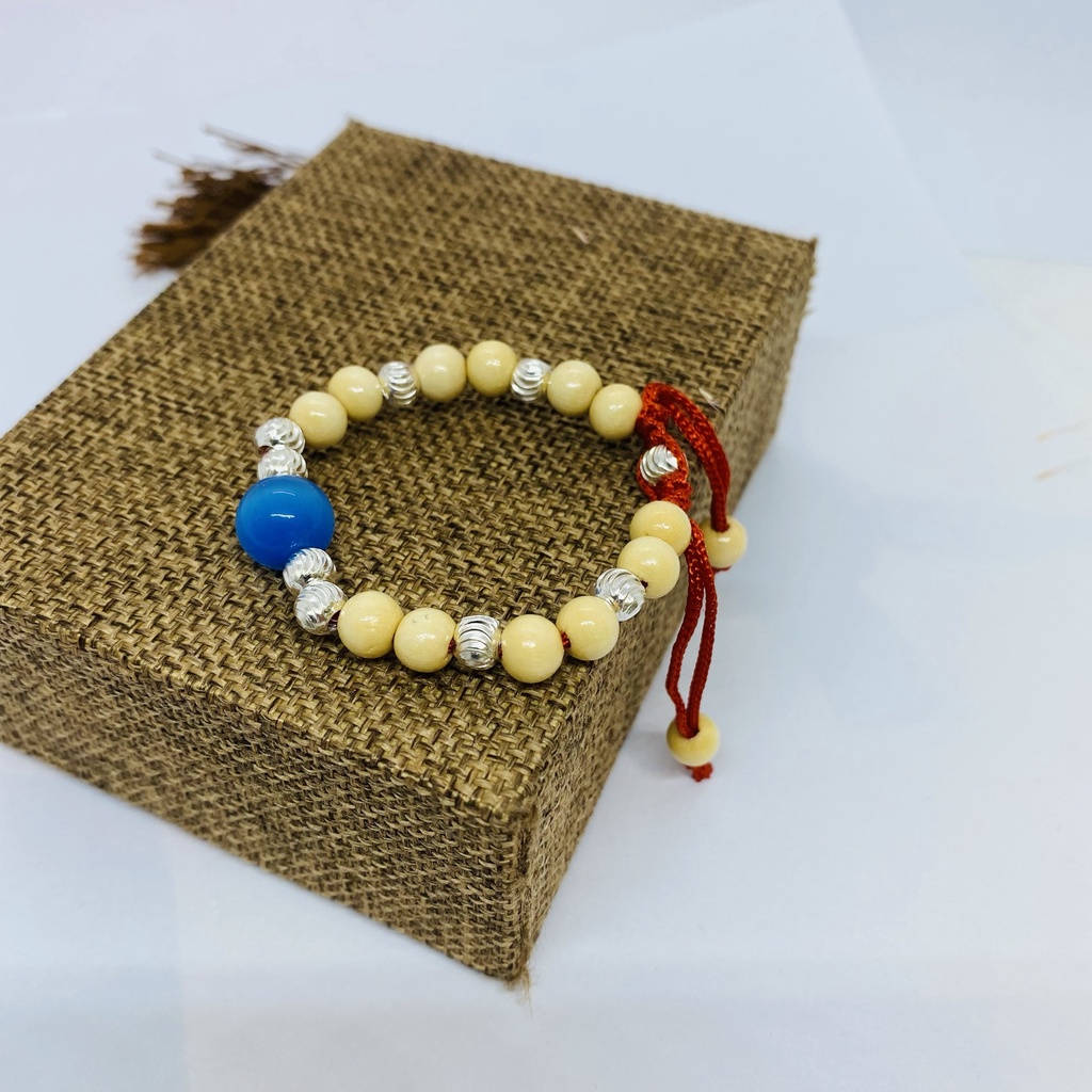 Vòng tay dâu tằm cho trẻ sơ sinh hình tròn xoắn bạc, đá các màu - trang sức Lợi Hoàn