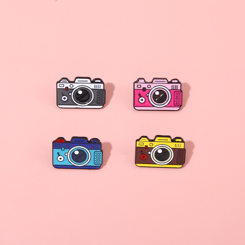 Ghim Cài Áo Hình Máy Ảnh 4 Kiểu Dáng Khác Nhau Màu Đen/Xanh Dương/Vàng Dùng Làm Quà Tặng Cho Bạn Bè