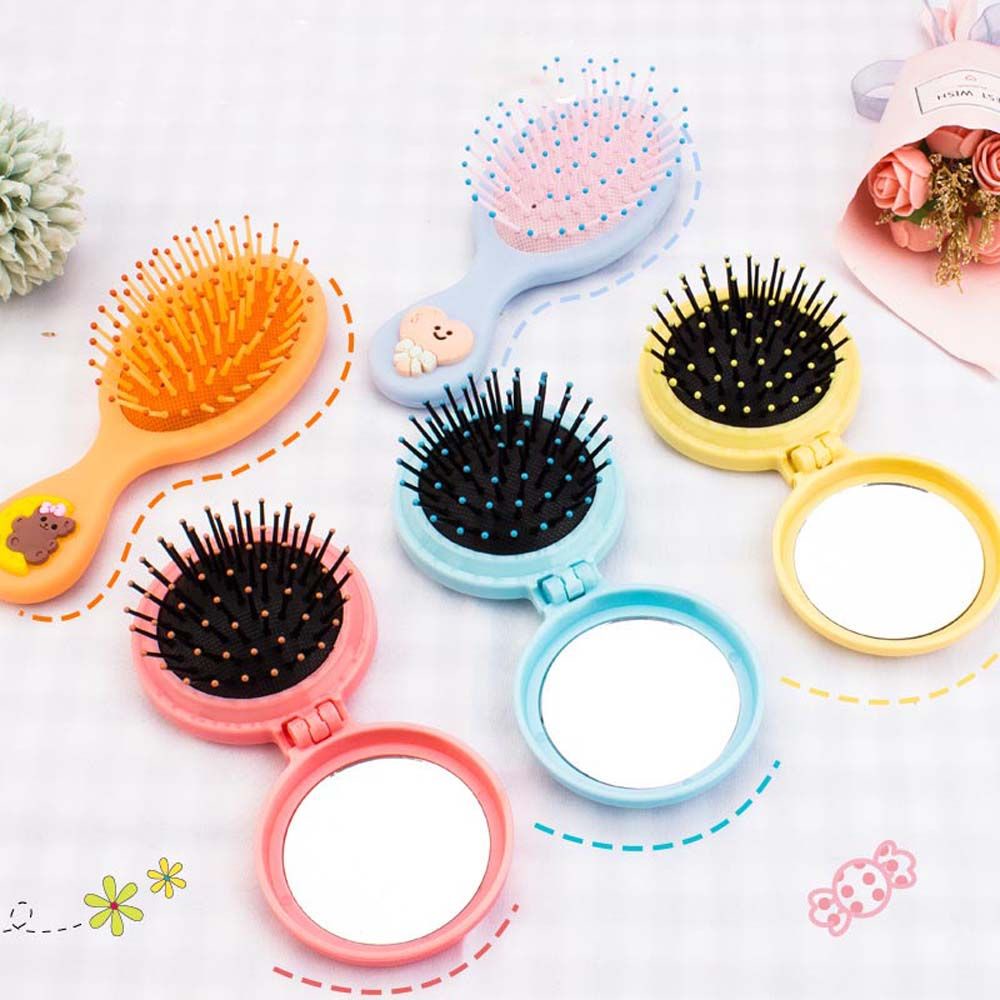 Lược chải tóc mini hình tròn gấp gọn kèm gương soi mát xa da đầu chống tĩnh điện thiết kế dễ thương