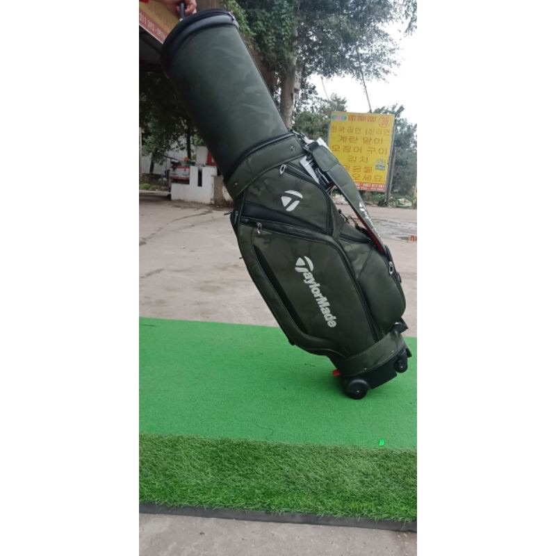 Túi Gậy Golf Hãng TaylorMade Bánh Xe Vải Bạt Siêu Bền, Chống Nước Tốt, Tặng Khoá Số Và Cover Mưa