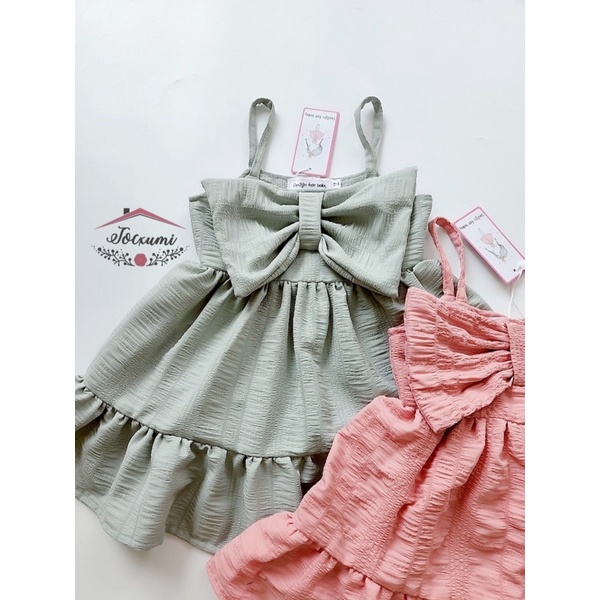 Váy hai dây nơ ngực xốp nhún 3 màu xinh xẻo - Tocxumi
