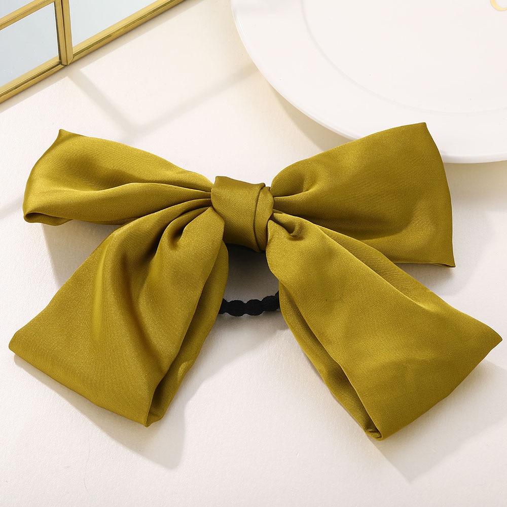 Thun Buộc Tóc Co Dãn Đính Nơ Xinh Xắn Cho Nữ