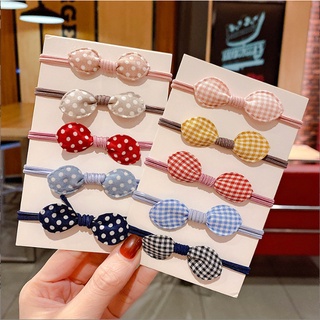 Dây cột tóc nơ chấm bi xinh xắn