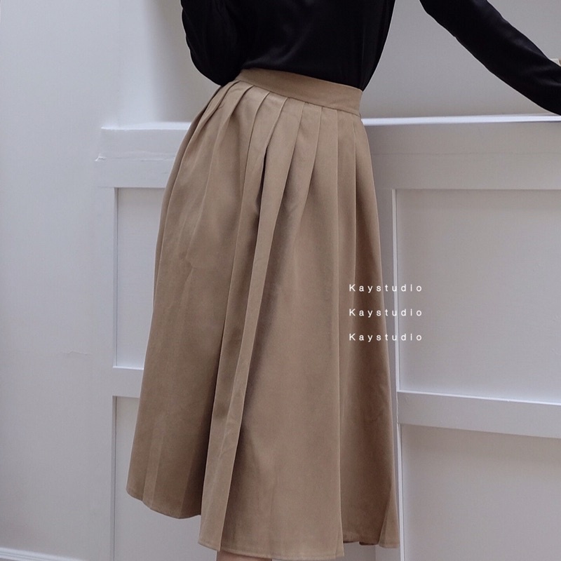 CHÂN VÁY NÂU BẢNG TO