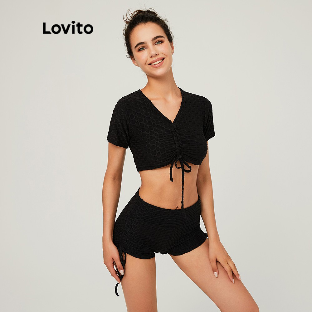 Bộ Đồ Thể Thao Lovito L03126 Tay Ngắn Cổ Chữ V Màu Trơn Dáng Ôm Có Dây Rút (Màu Đen) - Hàng mới về
