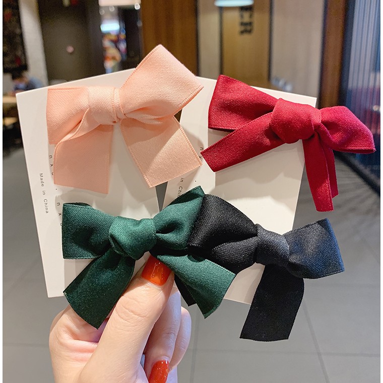 Kẹp tóc đính nơ phong cách ngọt ngào đáng yêu cho nữ