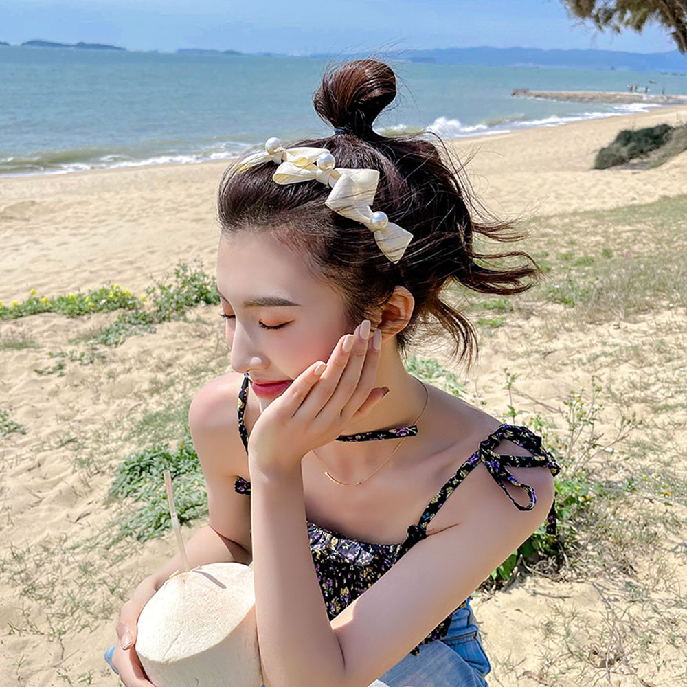 Băng đô vải thắt nơ đính ngọc trai nhân tạo