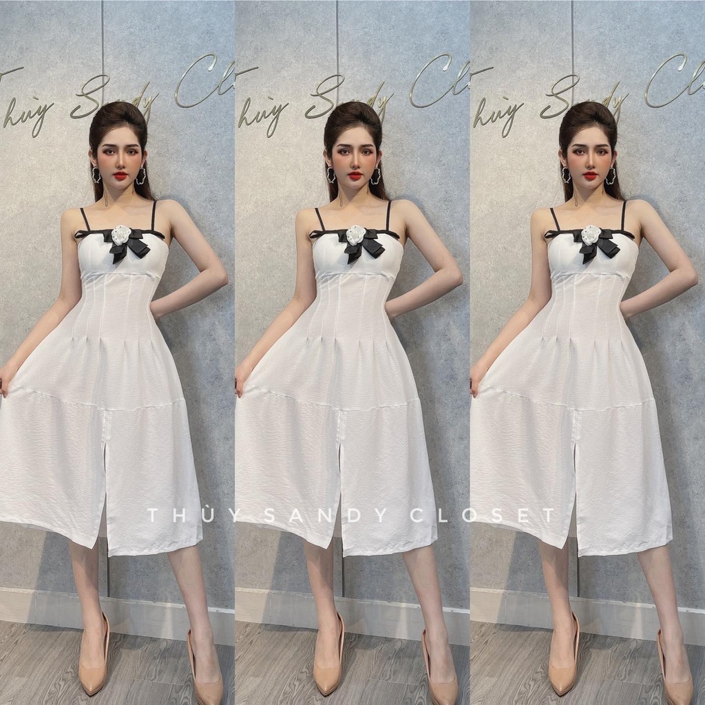 Đầm váy nữ dạ tiệc hai dây kết nơ xẻ tả màu trắng tinh khôi, sang chảnh.