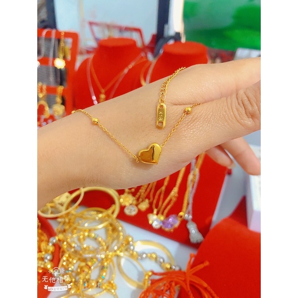 Trang sức Kiều Uyên LẮC CHÂN TIM TITAN