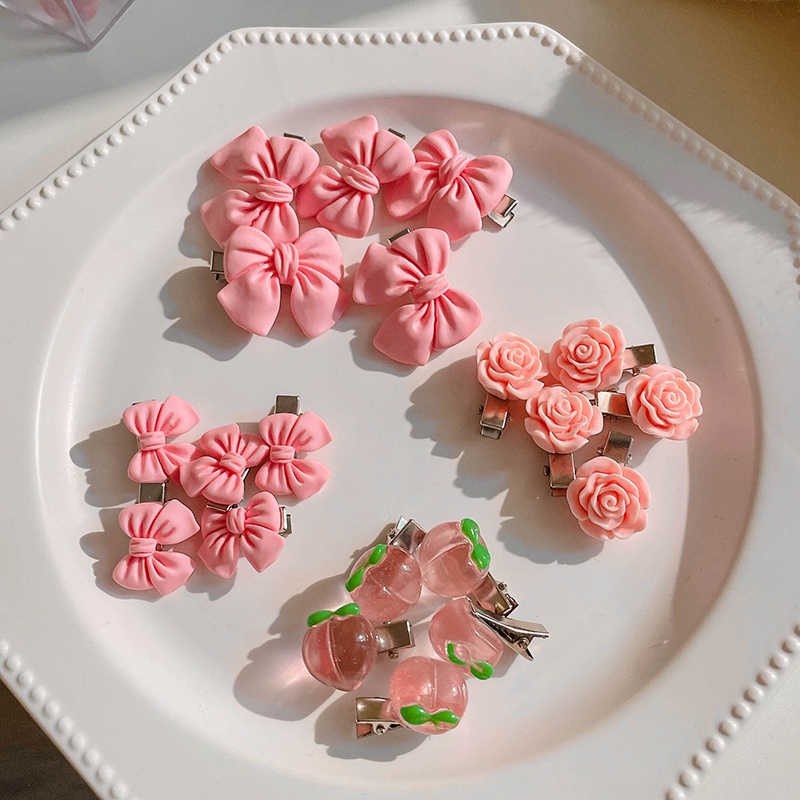 Kẹp tóc mini màu hồng dễ thương dành cho nữ