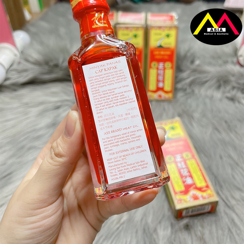 Dầu nóng Hồng Hoa hiệu cây búa , dầu gió giảm đau cơ lưng thấp khớp chuột rút bong gân bầm tím massage singapore 32ml