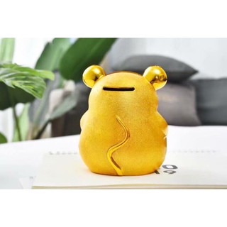 CHUỘT ĐỰNG TIỀN VÀNG.