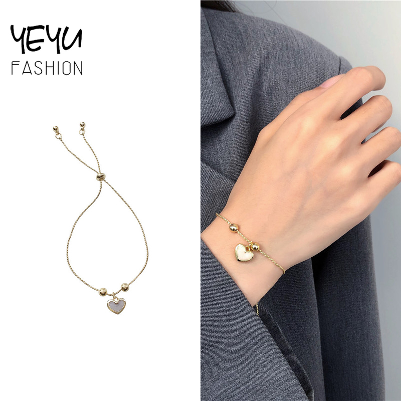 Vòng tay đính ngọc trai giả hình trái tim xinh xắn dành cho nữ