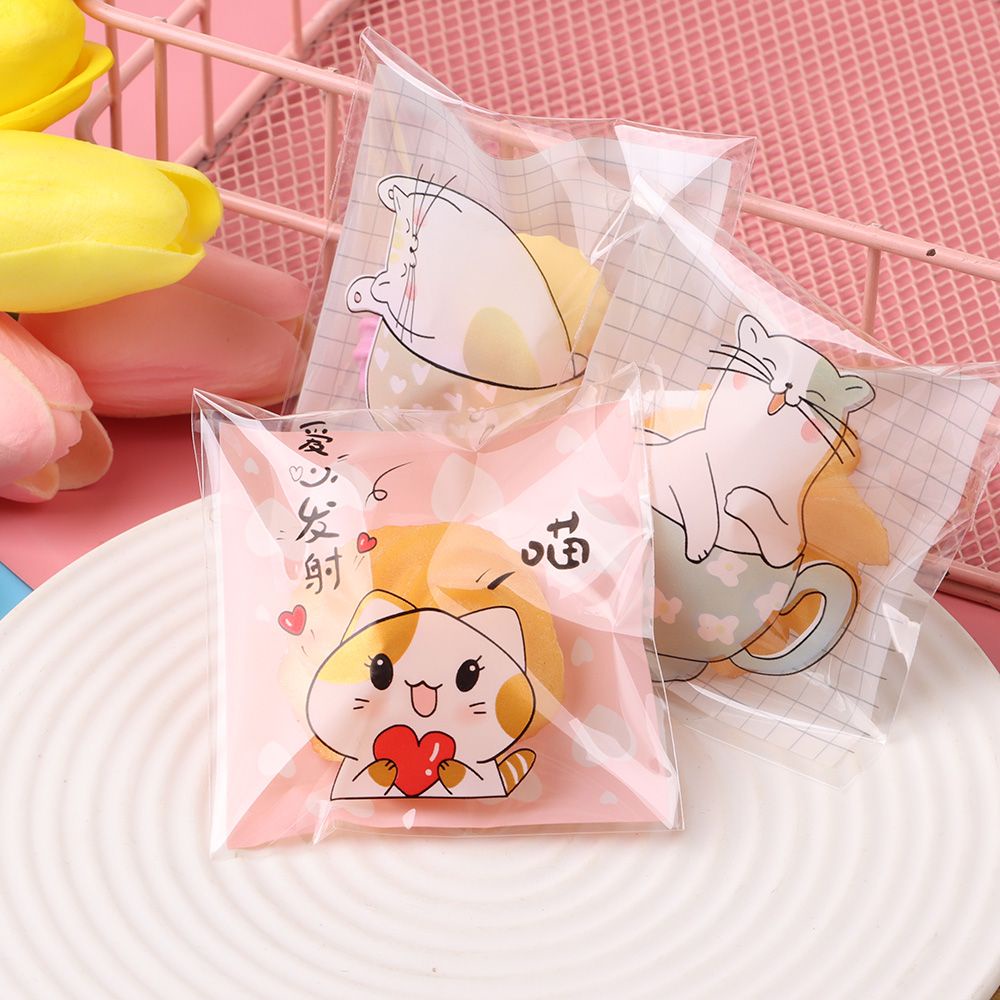 Set 100 Túi Nhựa OPP Kích Thước 7x7cm In Họa Tiết Mèo Hoạt Hình Có Keo Dán Dùng Để Đựng Bánh Quy