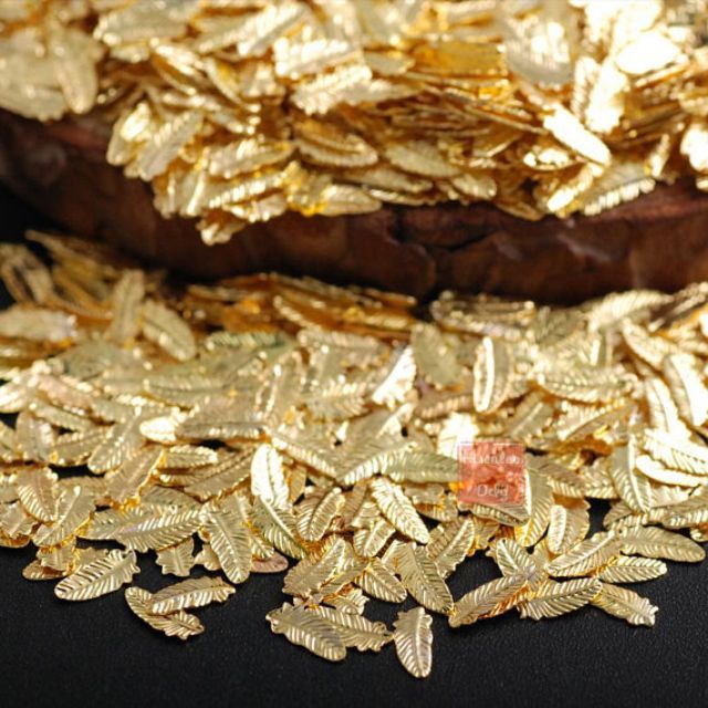Kim tuyến nhũ vàng hình lông chim