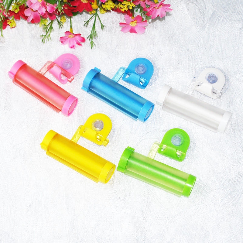 Ceative Rolling Squeezer Toothpaste Dispenser Tube Hanging Partner Holder