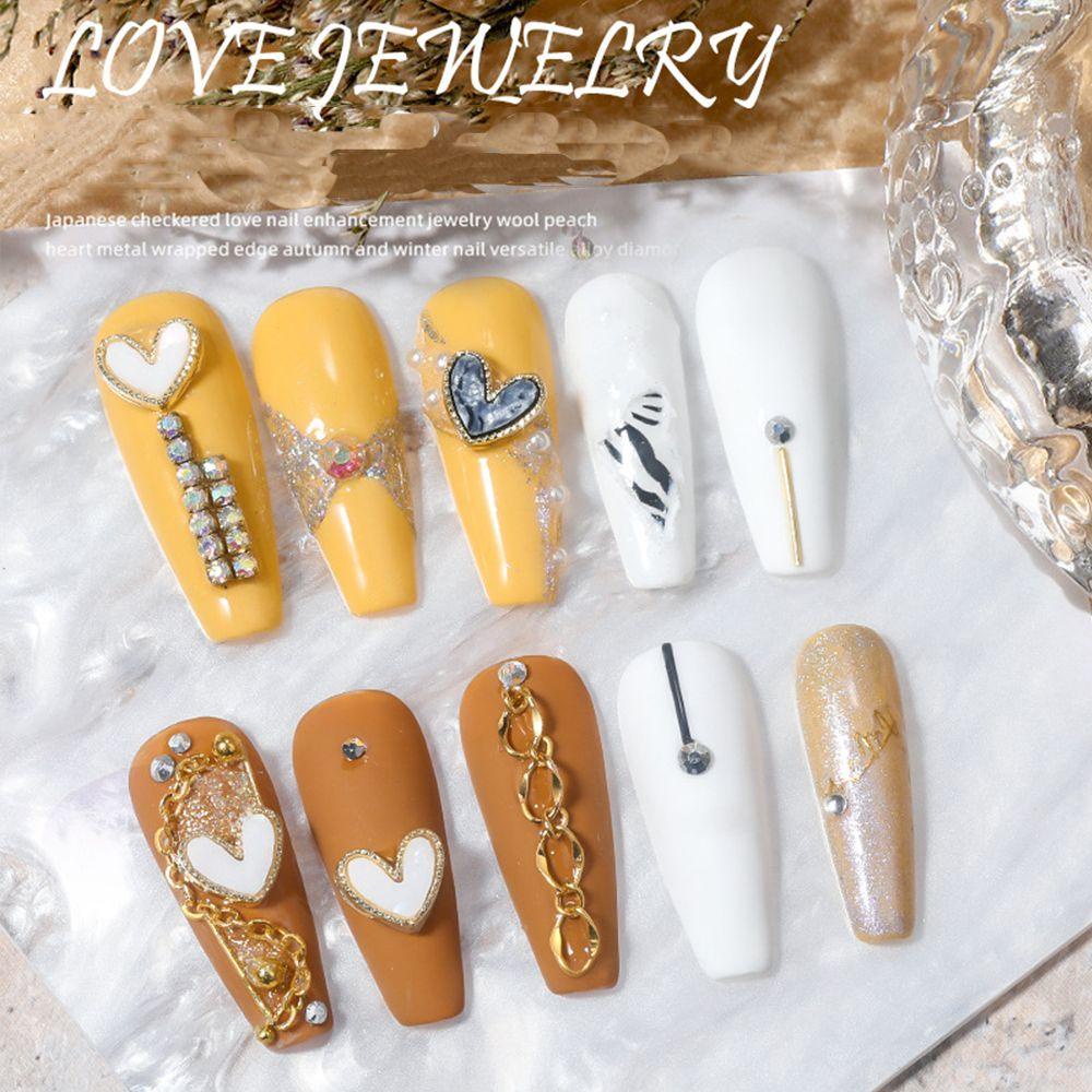 Set 10 Phụ Kiện Trang Trí Móng Tay 3D Bằng Hợp Kim Hình Trái Tim Thời Trang