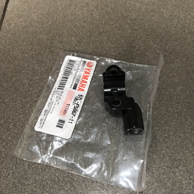 5TL-F5867-11 | Bên Phải | Cùm chân gương Exciter 150, 155, Jupiter Fi, Sirius Fi, NVX 155
