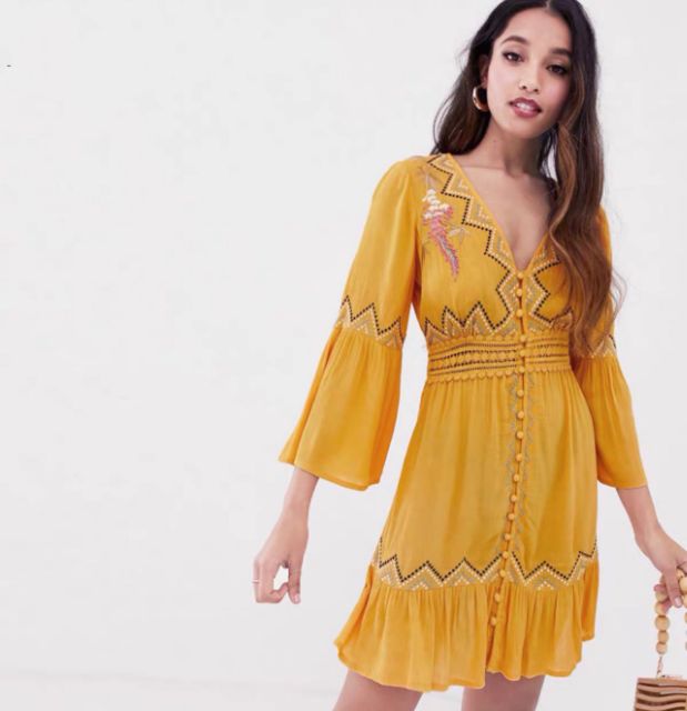 Váy nữ vàng thêu tay lỡ