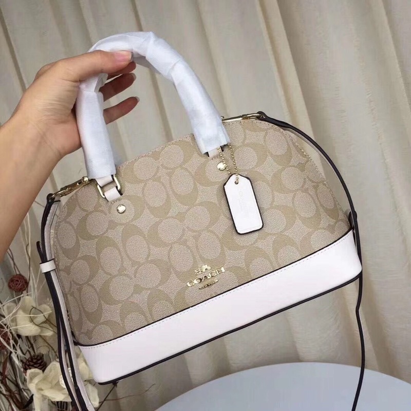 Túi xách C o a K hên dư