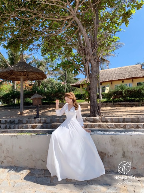 Đầm maxi trắng đi biển, đầm trắng tay dài cột nơ đính ngọc tà váy xoè dài HOANGYEN
