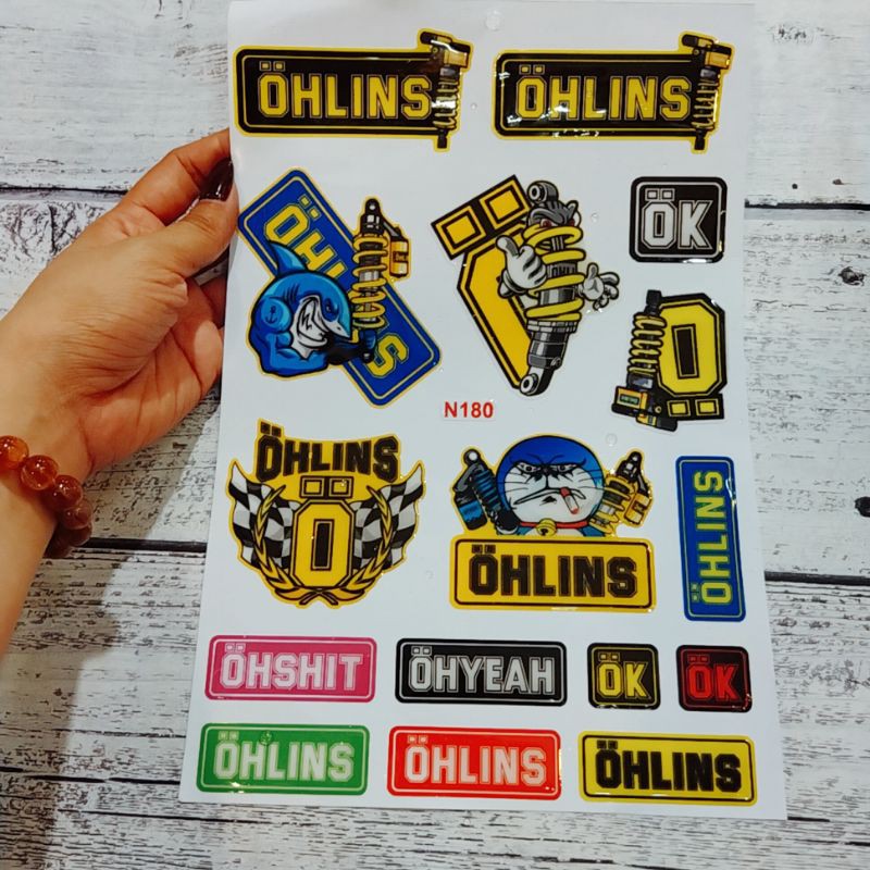 Decal tem dán đổ nổi tổng hợp mẫu Doraemon cầm phuộc Ohlins, tem chống nước tốt