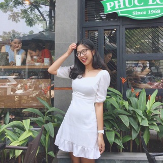 Đầm trắng chân bèo đan dây eo