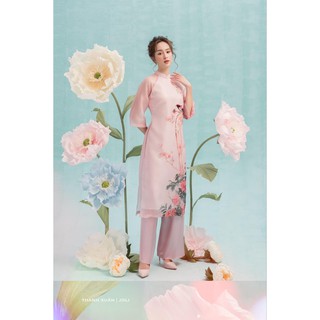 Áo dài OGANZA có lớp lót lụa cát tay lửng.