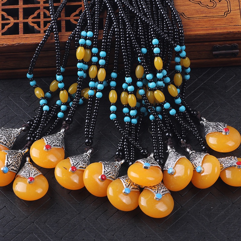 Boutique ethnic style long beaded sweater chain imitation beeswax pendant jewelry necklace temple fair