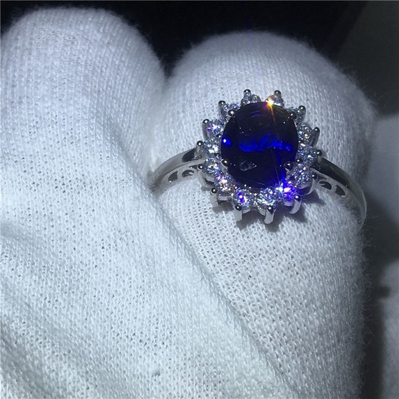 Nhẫn đính hôn đính đá Sapphire kiểu hoàng gia