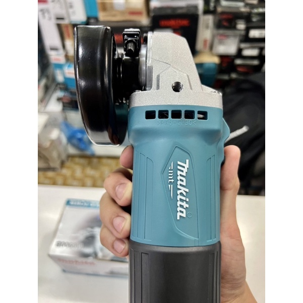 Máy mài góc cầm tay bằng điện Makita M0900B