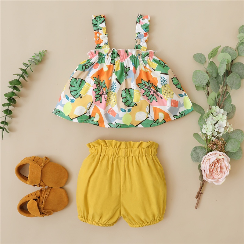 Set đồ 2 mảnh Mikrdoo gồm áo hai dây in hình hoa + quần short màu vàng phong cách mùa hè thời trang cho bé gái