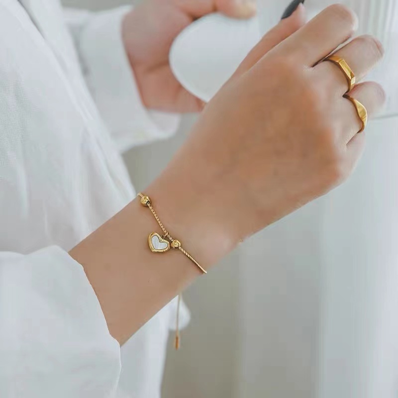 Vòng cổ / vòng tay / bông tai bằng thép titan hình trái tim phối xà cừ phong cách Âu Mỹ sang trọng làm quà cho nữ