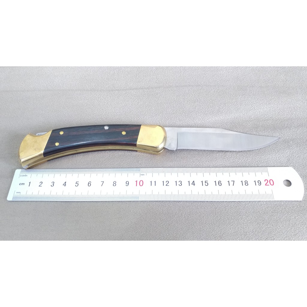 Dao gấp bỏ túi Buck 110 kèm bao da, phù hợp mang theo hàng ngày