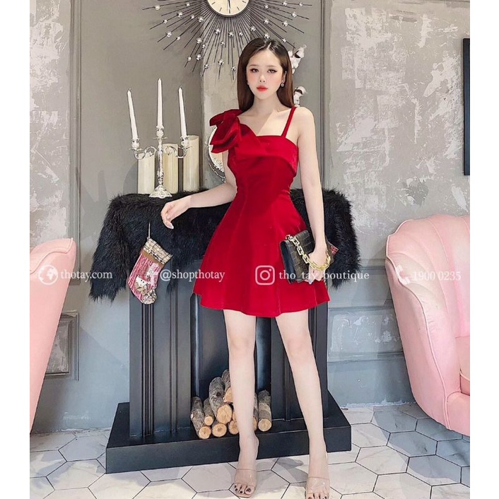 Đầm xoè Nhung đỏ tươi nơ đính vải cúp bằng vạt lật.
