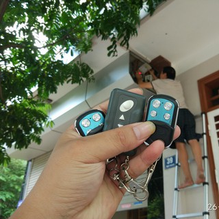 Remote cửa cuốn YH-1AA