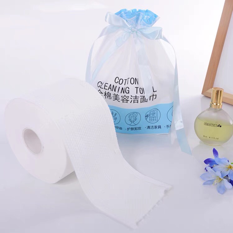 Khăn mặt khô dùng 1 lần lau khô, lau ướt , bông tẩy trang dạng cuộn kèm túi rút
