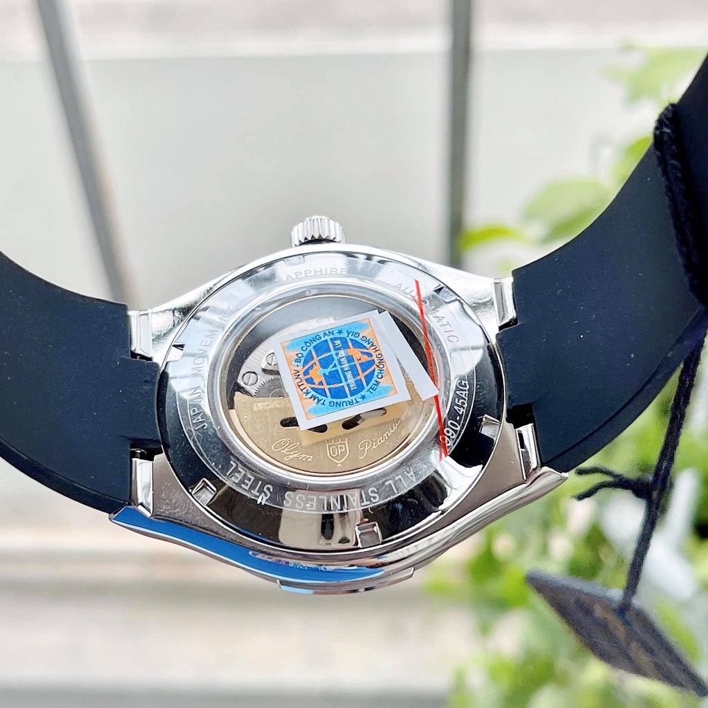 Đồng hồ nam Olym Pianus OP990-45 chính hãng- mặt trắng, kim xanh; Phiên bản kiểu dáng Hublot; New 100, Full box