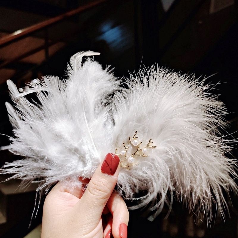Cài tóc lông vũ màu trắng 💖💖💖