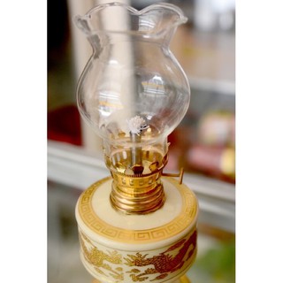 đèn dầu sứ rồng vàng