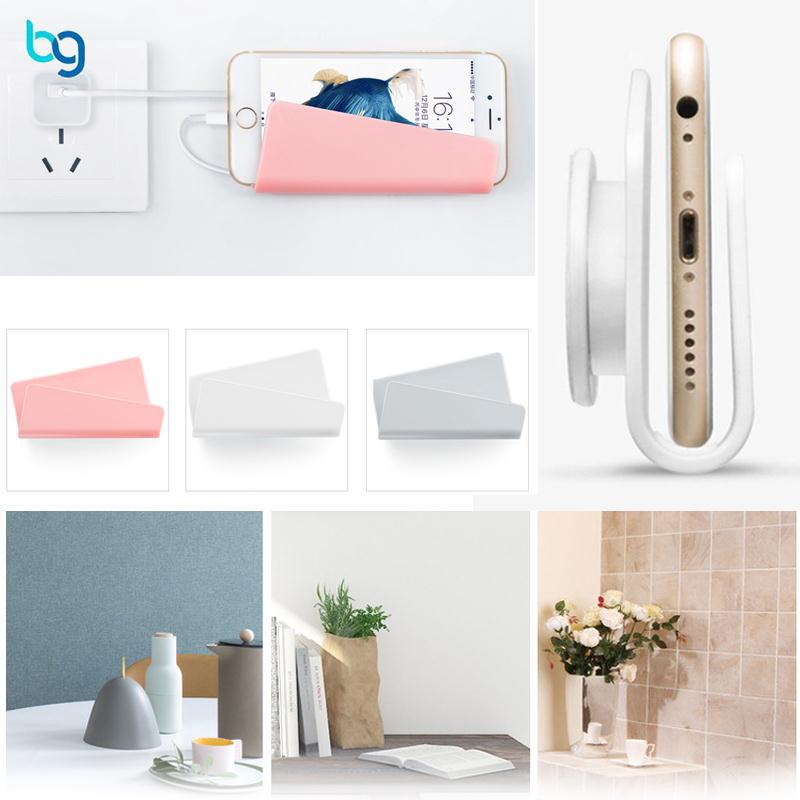 Kệ dán tường để điện thoại khi sạc