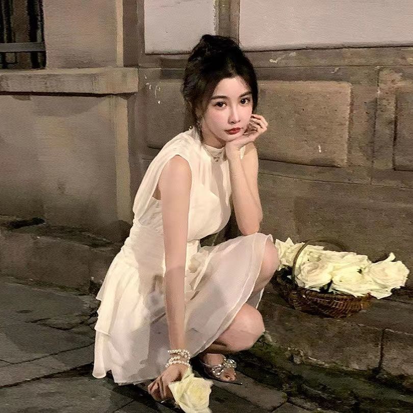Sleeveless irregular white dress women's dress 2022 summer new first love department stand collar design sense minority skirt