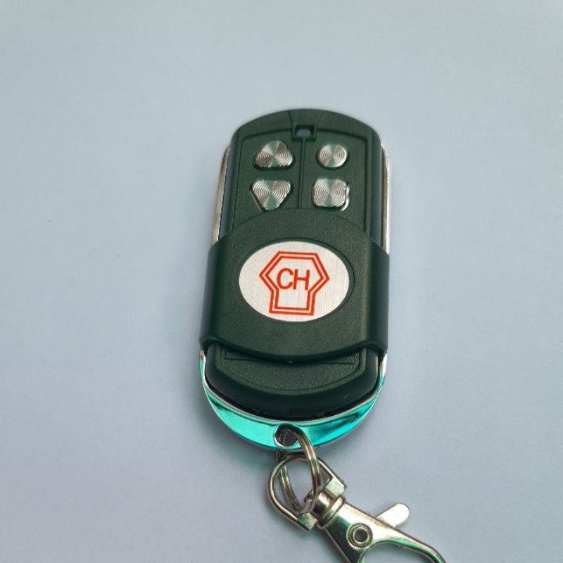 Remote tay điều khiển cửa cuốn CH 365 mã nhảy đèn đỏ đài loan