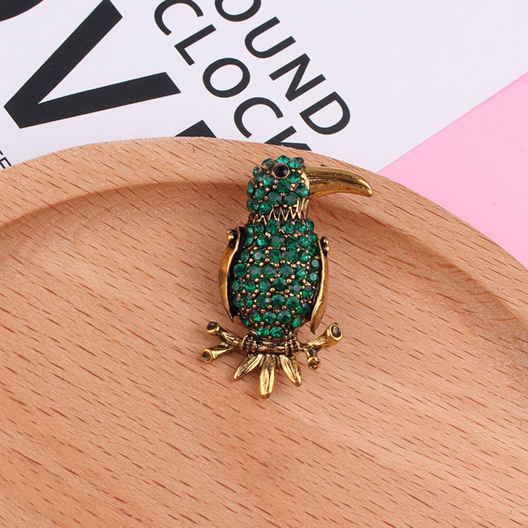 Trâm cài áo hình chim vẹt đính đá pha lê xanh lá phong cách retro