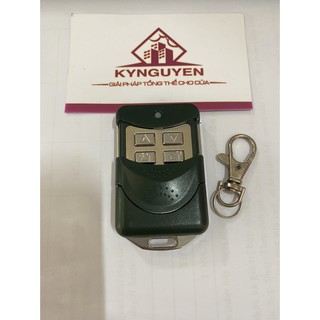Tay điều khiển cửa cuốn mã 433