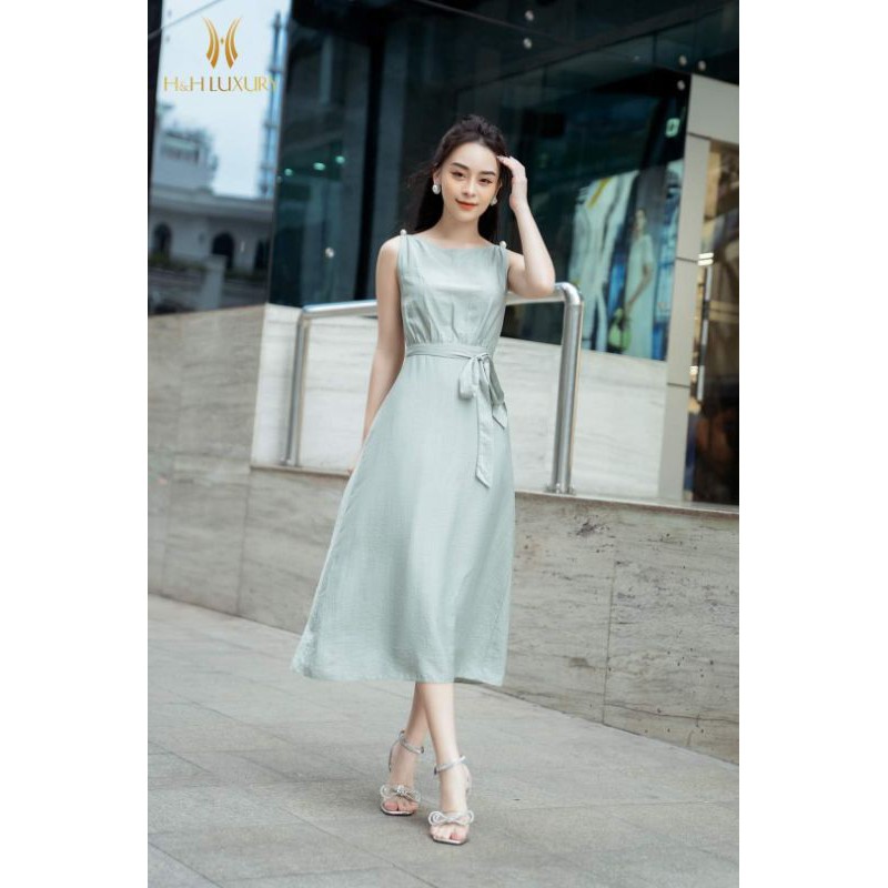 váy lụa xanh đính trai vai